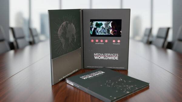 Media Services Worldwide video folder with built-in HD screen for corporate presentation.